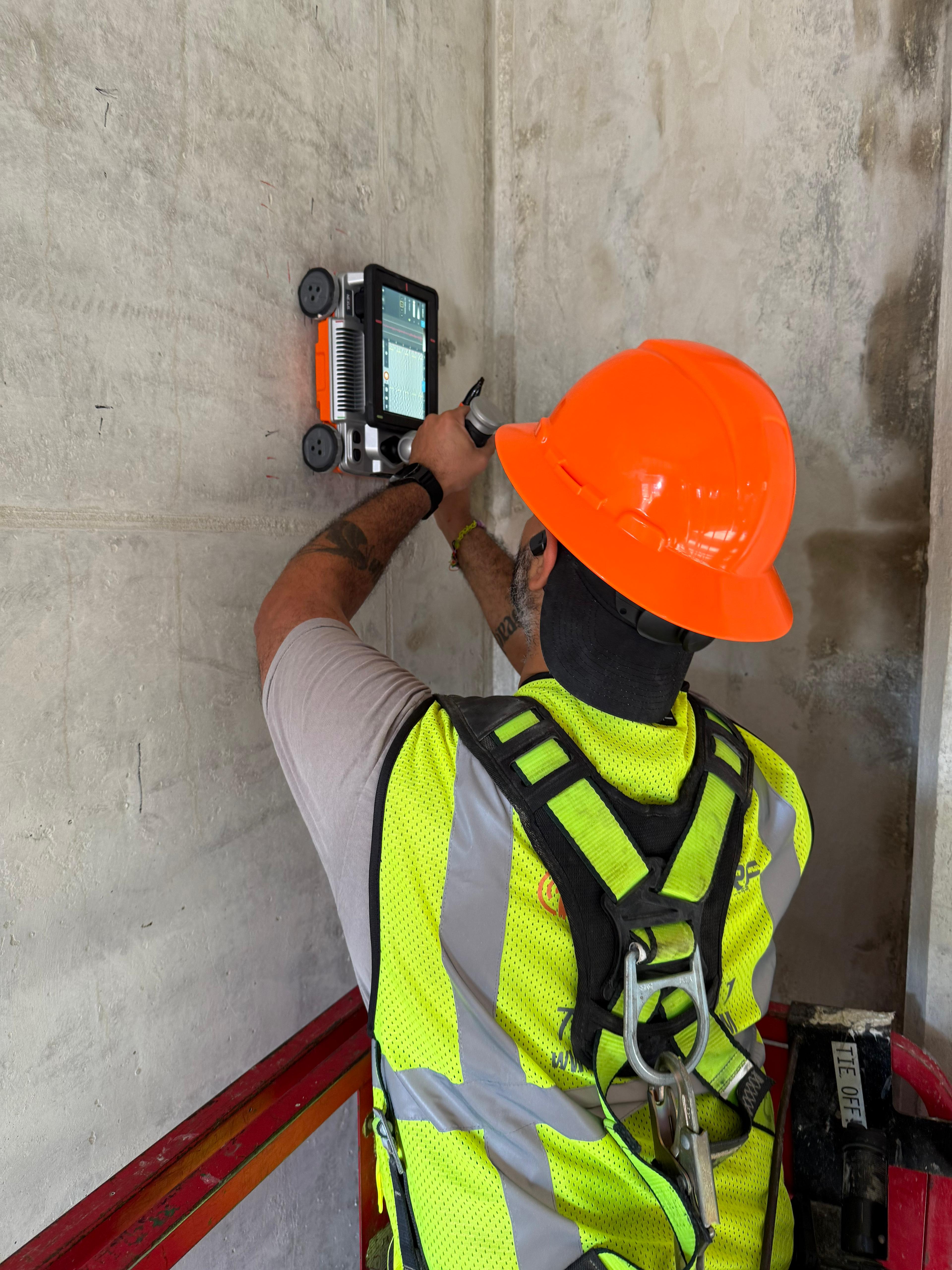 Pro Core GPR technician performing concrete scanning with GPR equipment