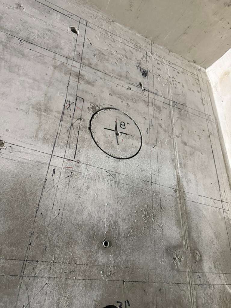 Concrete coring drill with water collection system